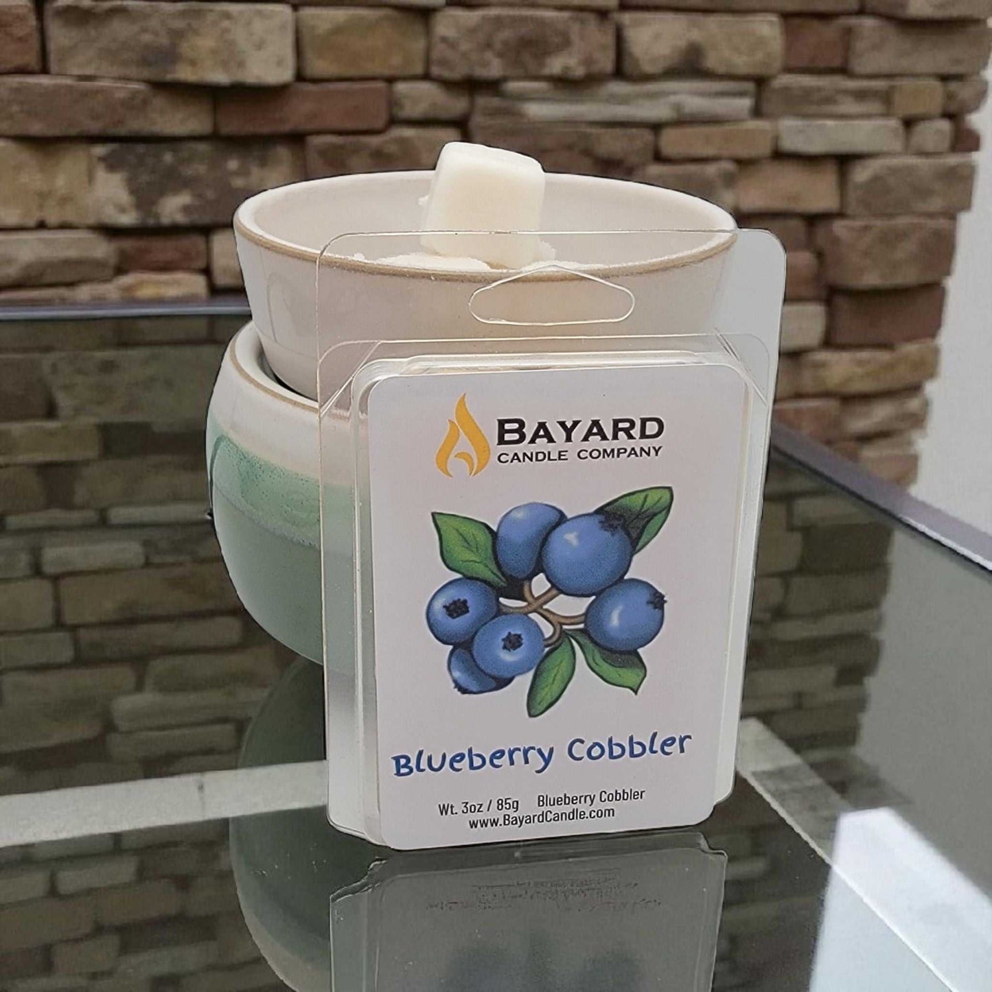 Blueberry Cobbler Soy Wax Melt on a glass table