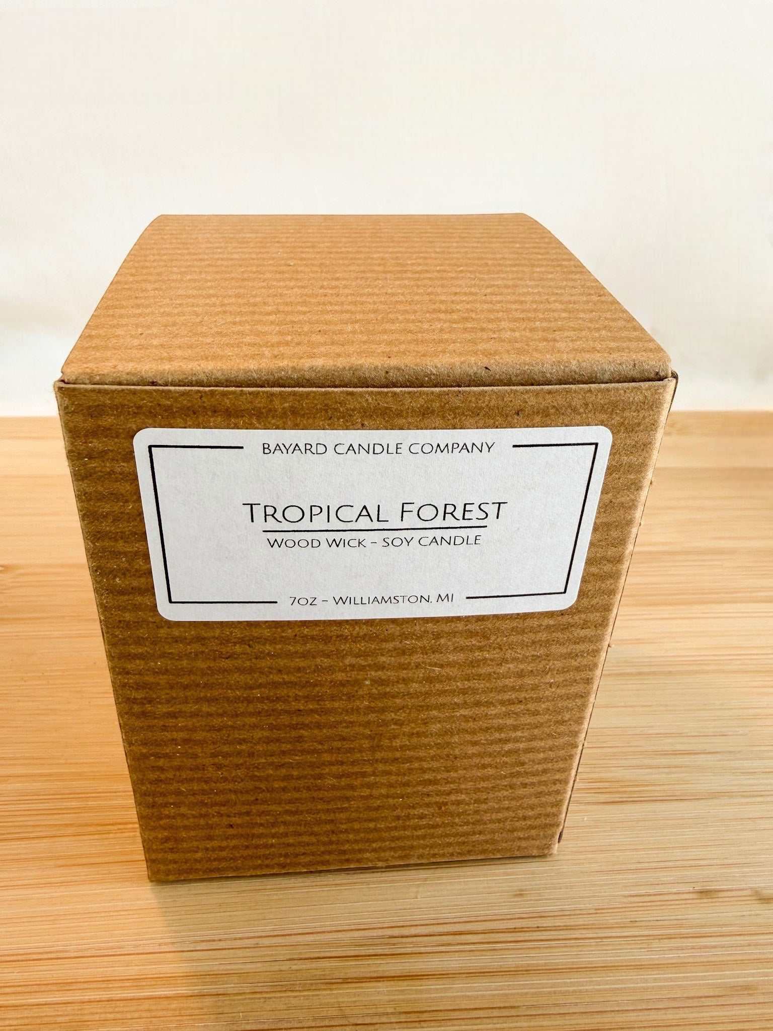 Tropical Forest wood wick soy candle packaging in a Kraft candle box