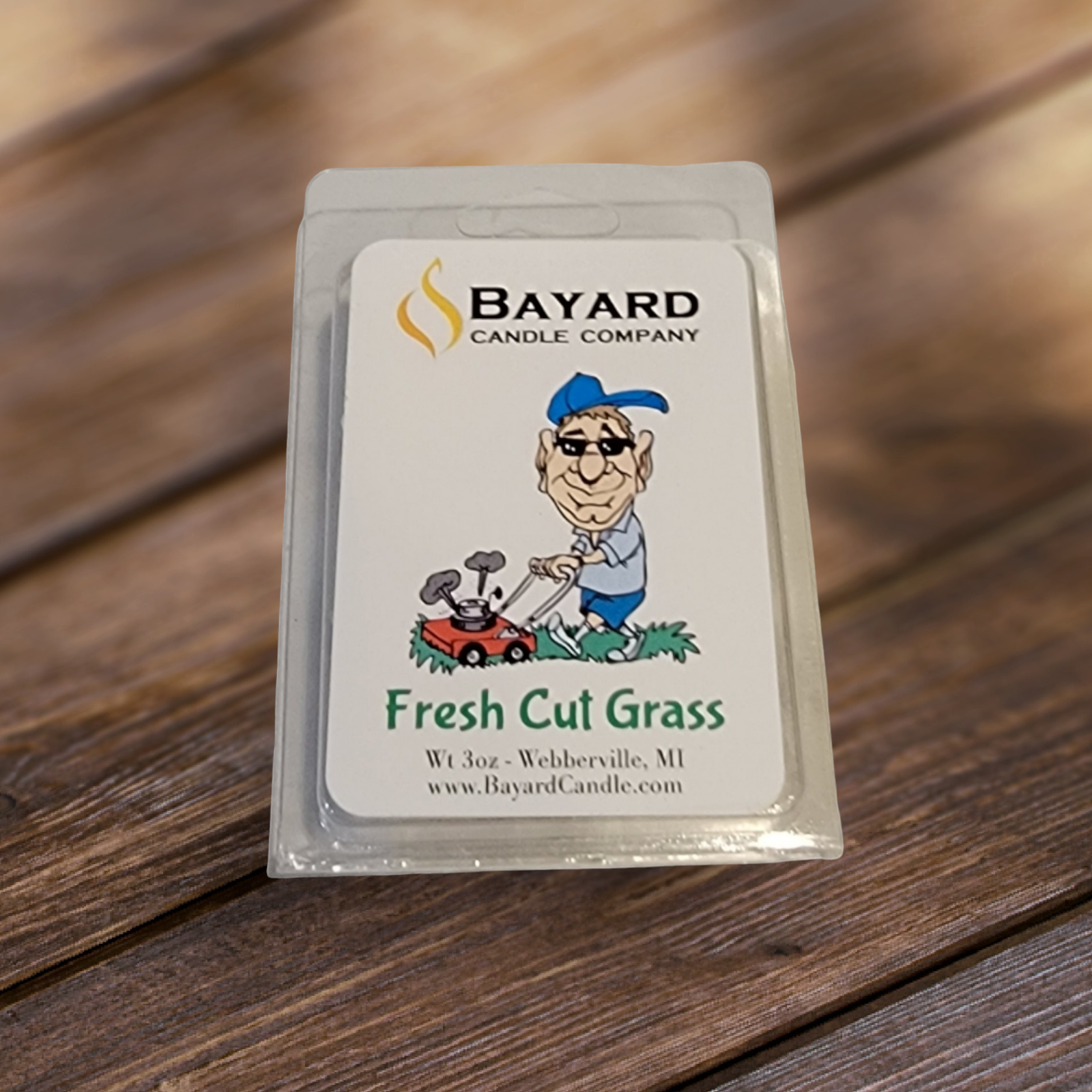 Fresh Cut Grass Soy Wax Melt on a wood table