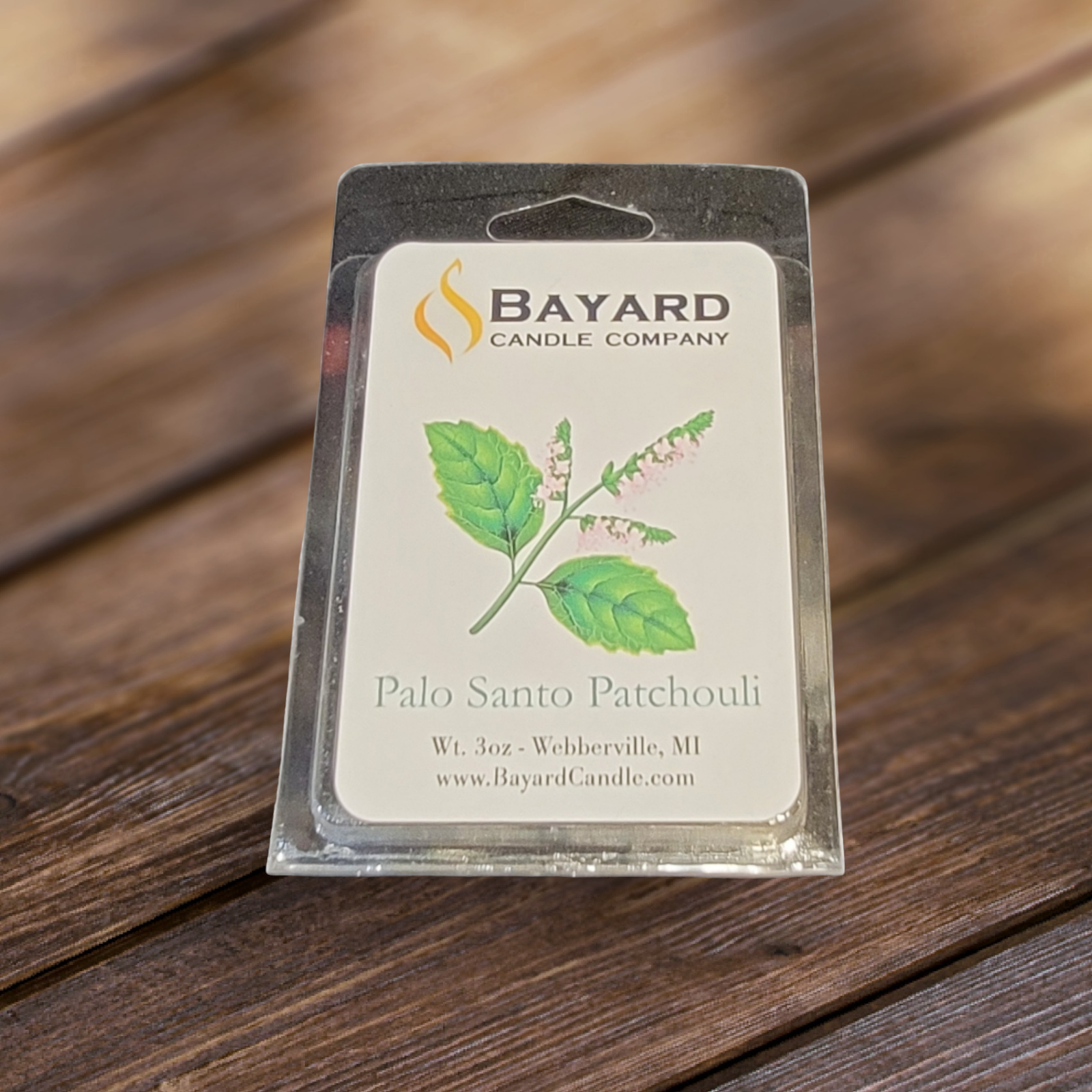 Palo Santo Patchouli Soy Wax Melt on wood table 