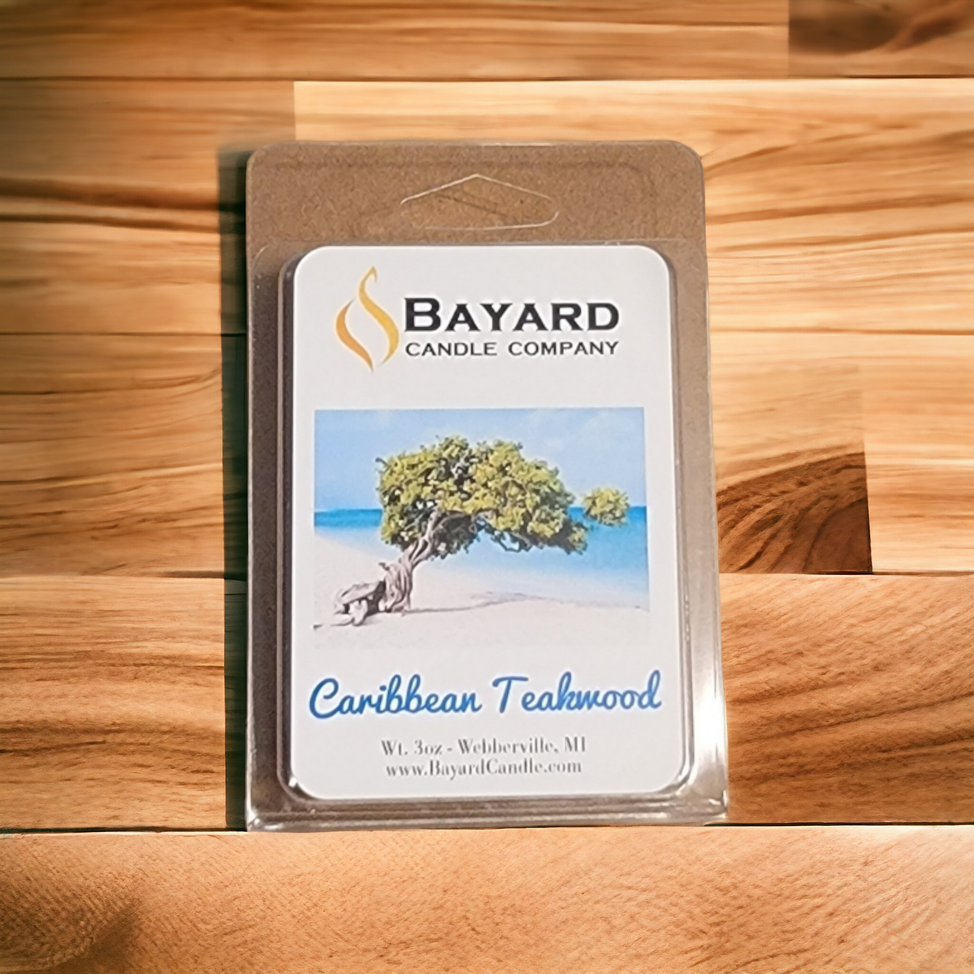 Caribbean Teakwood Soy Wax Melt on a wood counter top
