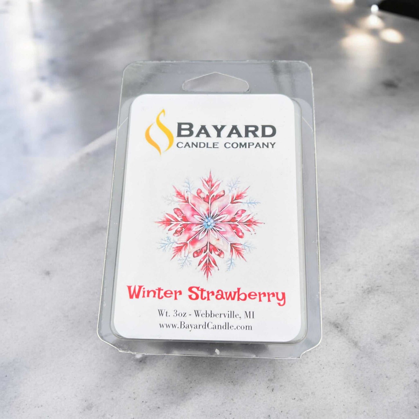 Winter Strawberry Soy wax melt on concrete counter top