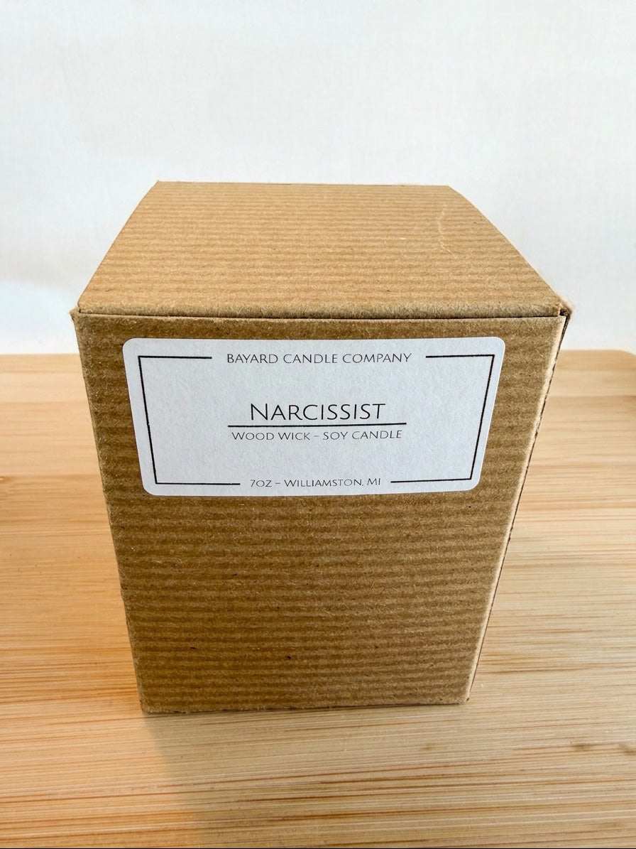 Narcissist candle gift box packaging with kraft box on wood surface