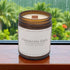Hawaiian Rain Wood Wick Candle by a rainy window in Hawaii 