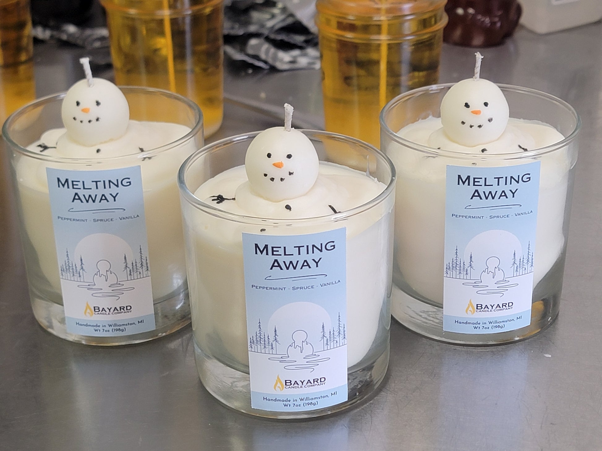 Melting Away Snowman Candle on a store shelf