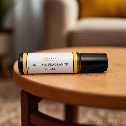 Angel Roll On Fragrance on a wood table 