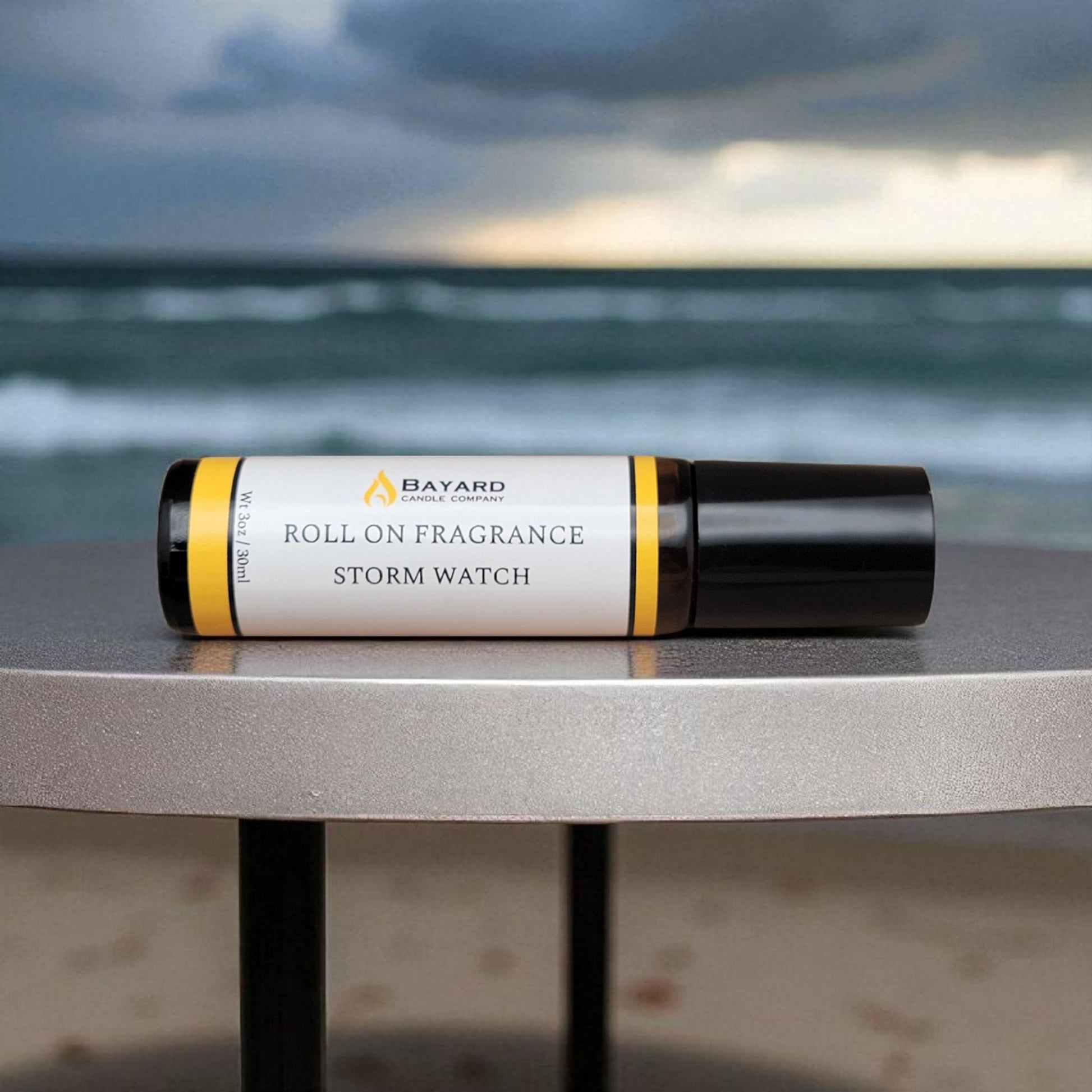 Storm Watch Roll On Fragrance on a table 