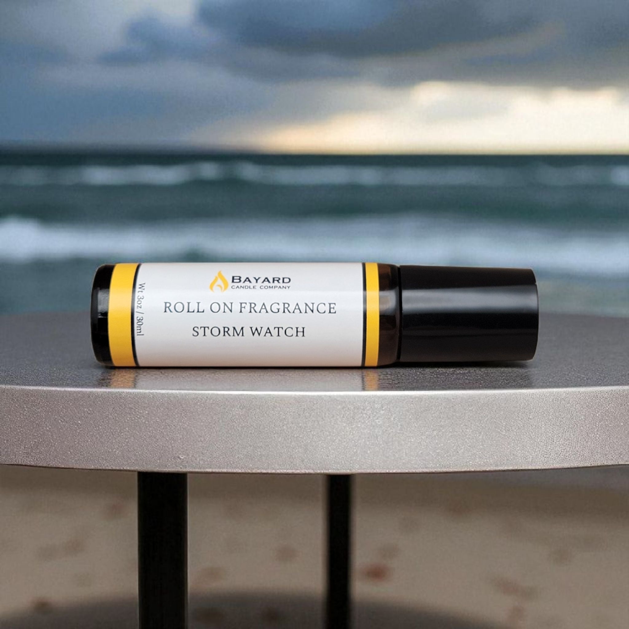 Storm Watch Roll On Fragrance on a table 