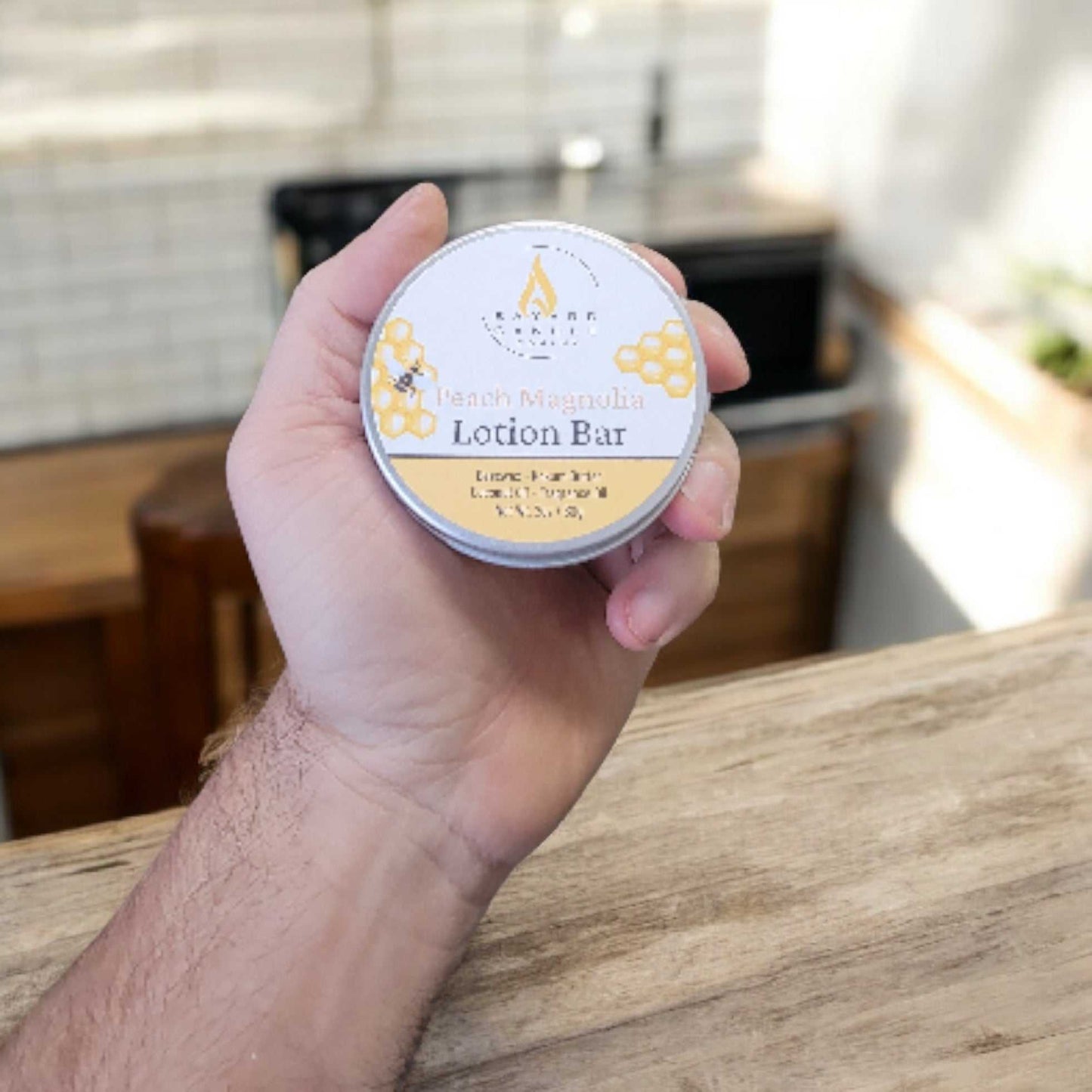 Bayard Solid Lotion Bar in a hand for reference