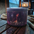 A candle tin labeled &