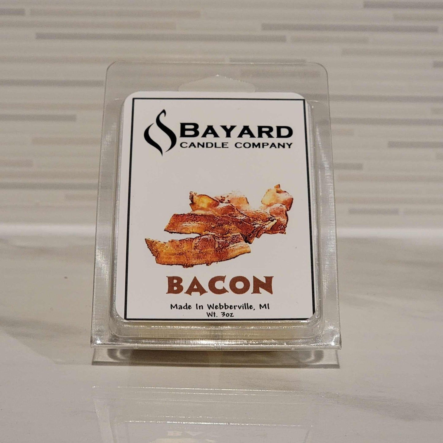 Bacon Soy Wax Melt on a Marble Table