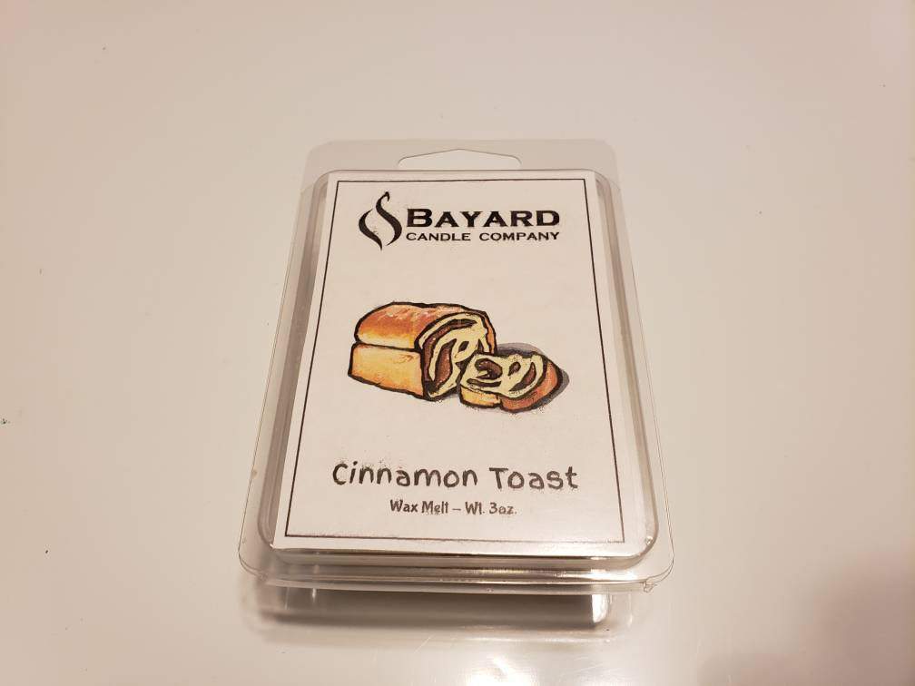 cinnamon toast soy wax melt on a marble table