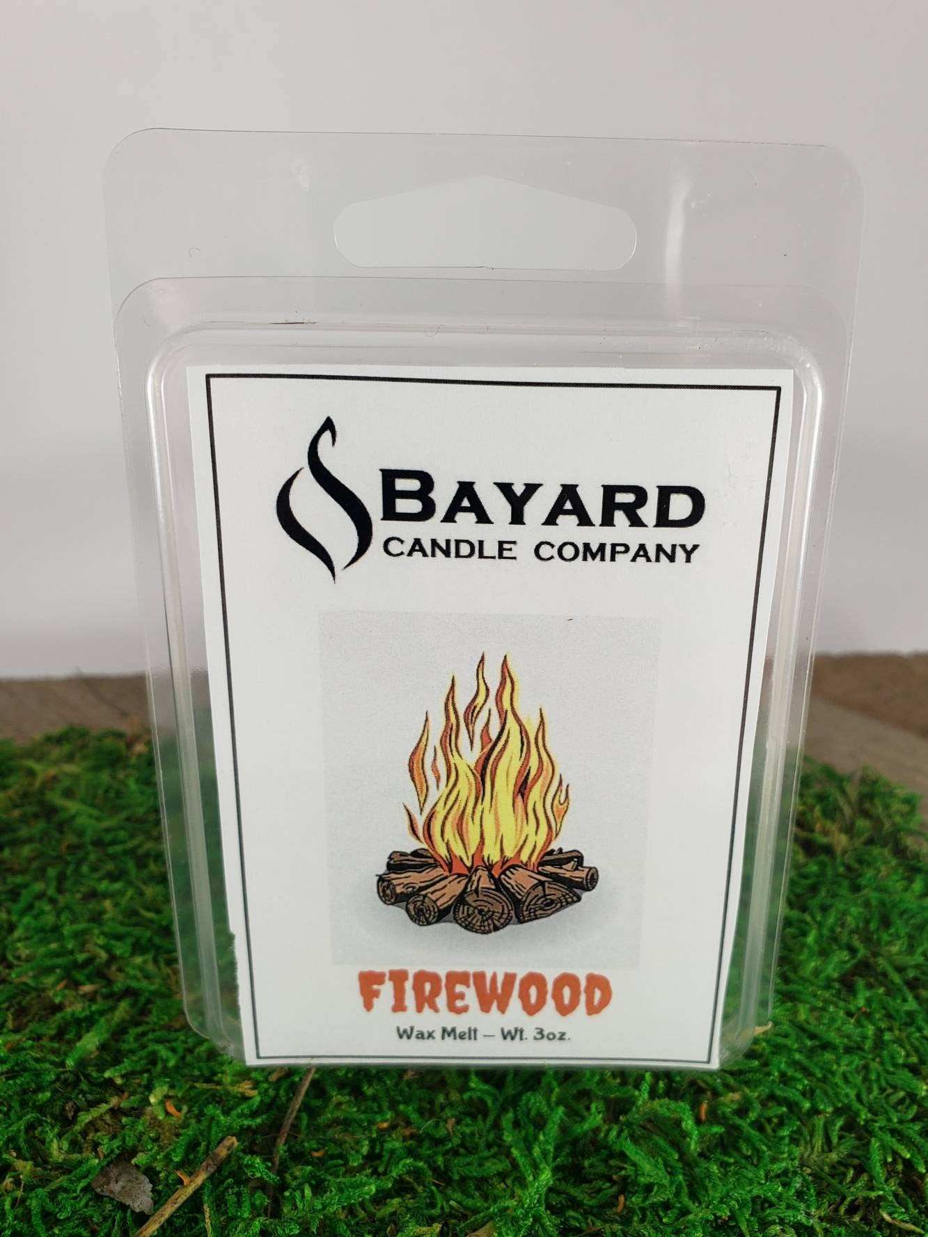 firewood soy wax melt on grass